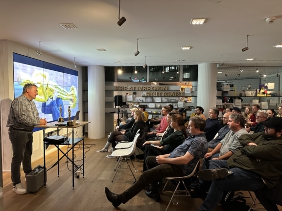Präsentation mit Vortrag an ein Publikum